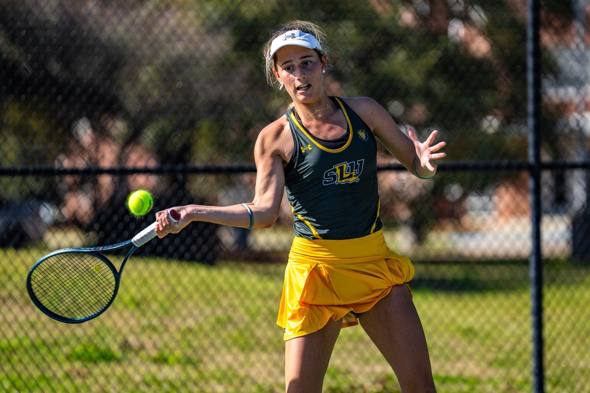 Freshman Aitana Darder sets up to strike the ball over the net.