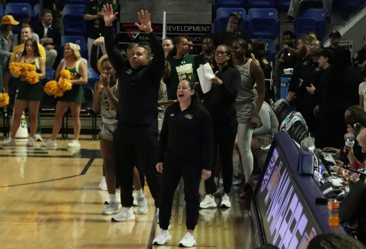 Former Lady Lions basketball head coach Ayla Guzzardo shows her emotion on the court during the first half of the Southland Conference Women's Basketball Tournament Championship game at the Legacy Center — an arena she will now call home. (Lake Charles - March 13, 2025)