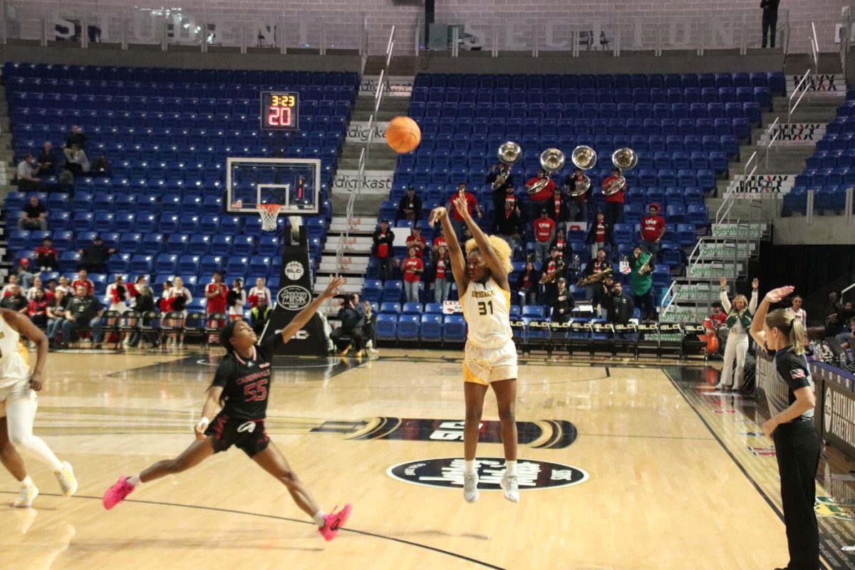 Graduate SLU guard Alexius Horne launches a three against UIW in the semifinals of the Southland Conference Women's Basketball Tournament Championship at the Legacy Center in Lake Charles. 