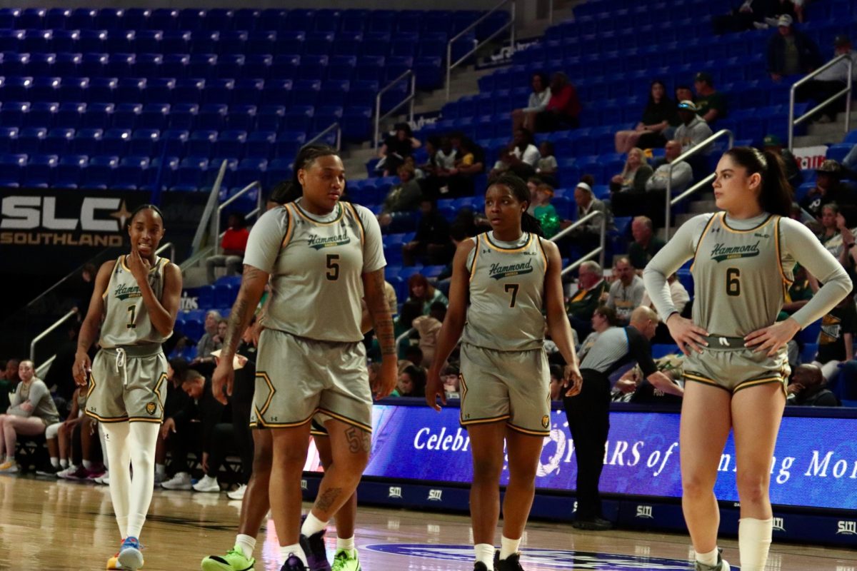 Lady Lions players from left, Jalencia Pierre, Taylor Bell, Tyreona Sibley and Kaili Chamberlin return to the court following a timeout. 