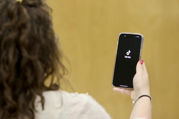 News editor Lindsay Miller pulls out her phone to open TikTok, one of the most popular apps in the world.