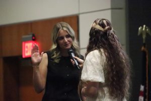 The 2025-2026 SGA Chief Justice Kayla Edwards swears in Maria Nachaeva as the 2025-2026 SGA President. 