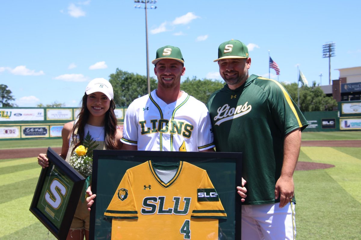 On Senior day, Jude Hall received his senior gifts, along with the other seniors from Head Coach Bobby Barbier