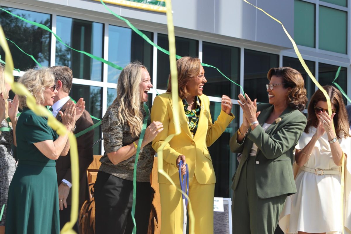 Former Vice President for Advancement Wendy Lauderdale stands alongside SLU alumna and Good Morning America co-host Robin Roberts and other higher education officials at the official grand opening of the newly-renovated D Vickers Hall.