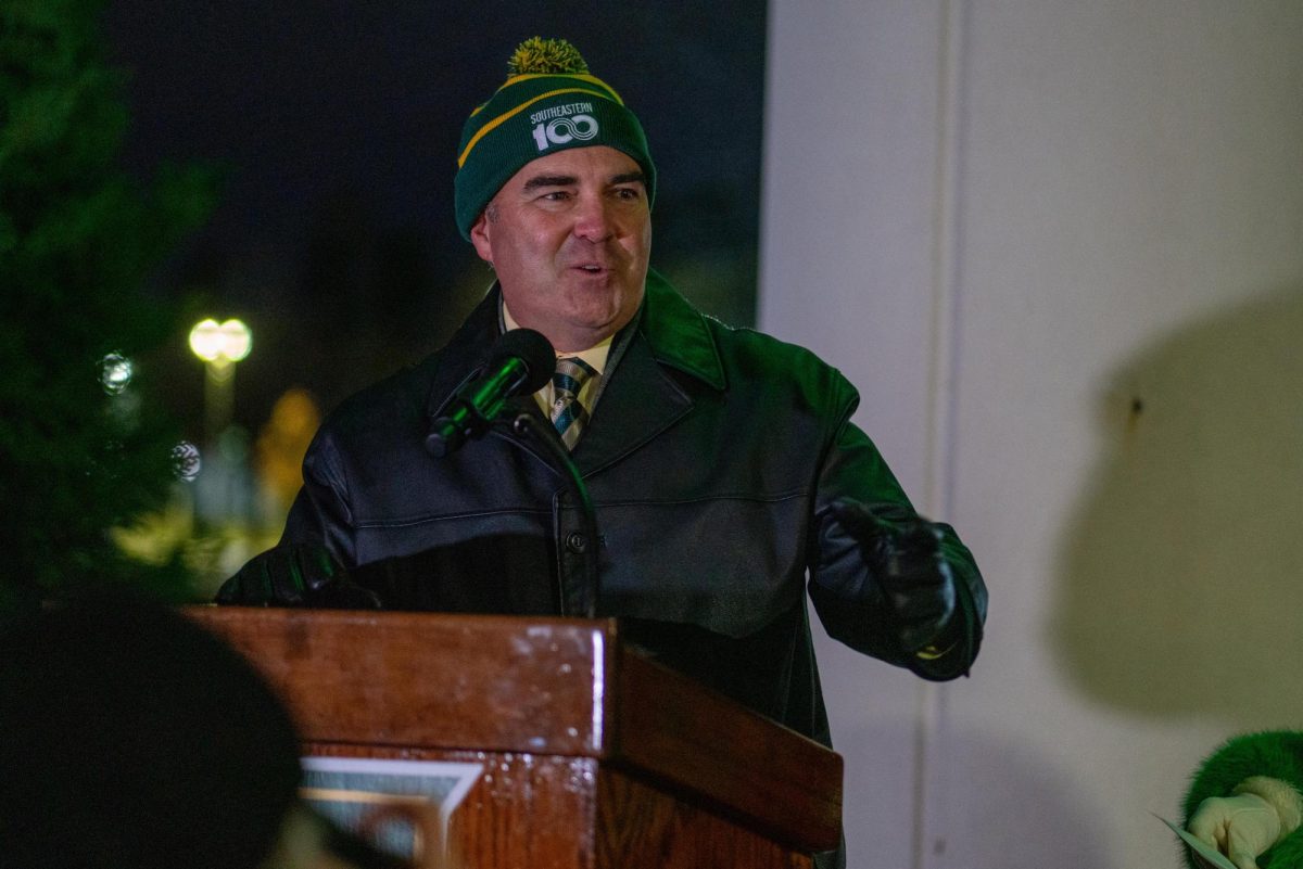 Man speaking at podium.