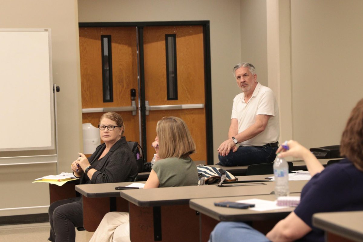 People sitting in a room.