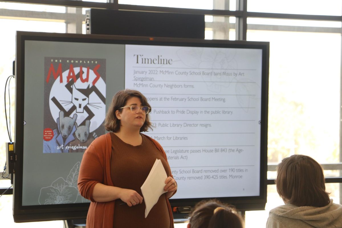 Woman speaking at event.