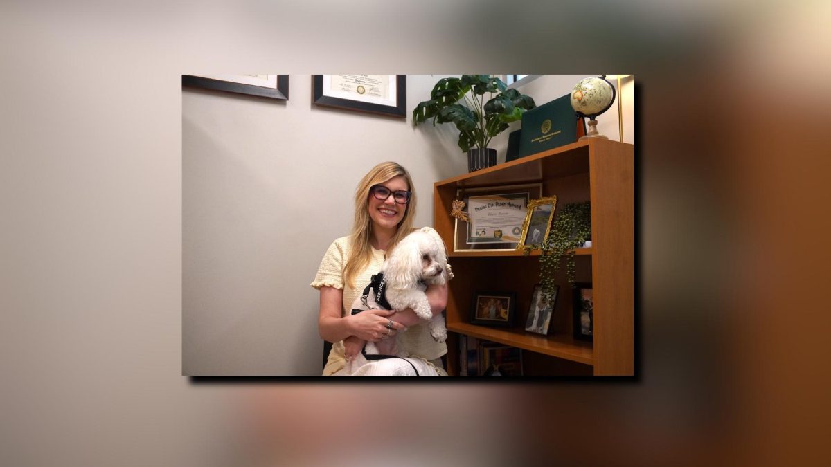 A person with her dog.