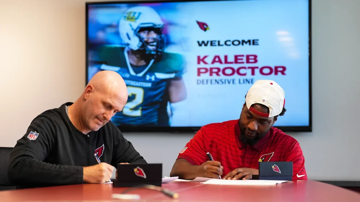 The Arizona Cardinals announced Kaleb Proctor signed his contract with Cardinals general manager Monti Ossenfort inside the Cardinals facility on Monday, June 22. 